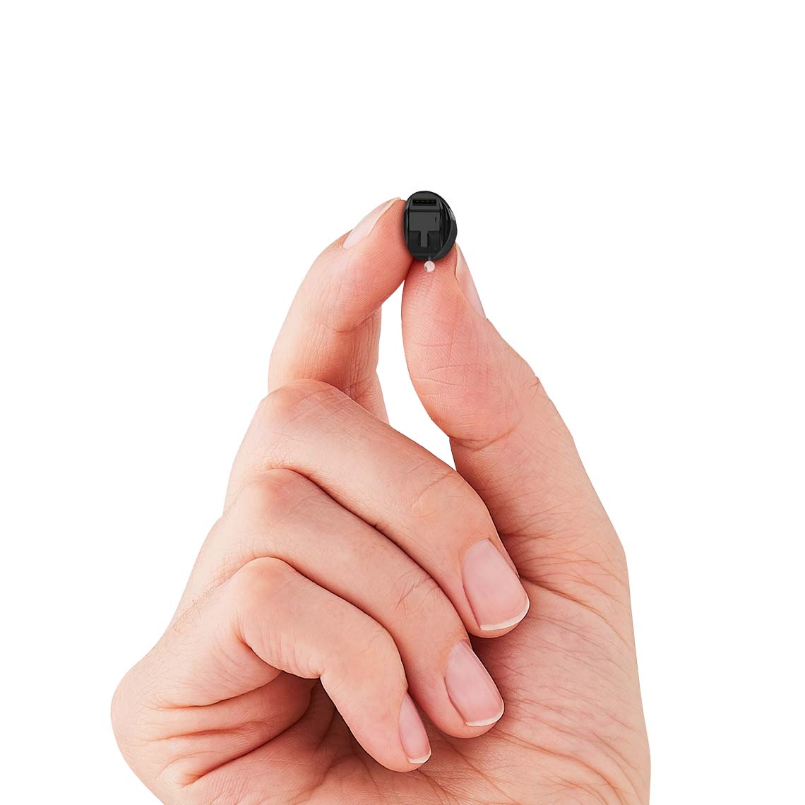 An IIC hearing aids being held in a hand